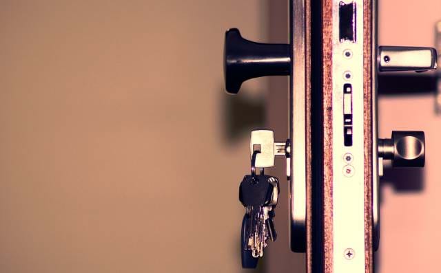 Locking down access to resources Side view of a door with mutiple locks