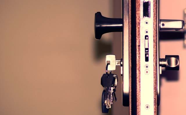 Side view of a door with mutiple locks