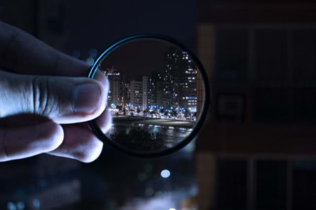 Image of Magnifying glass looking at a city