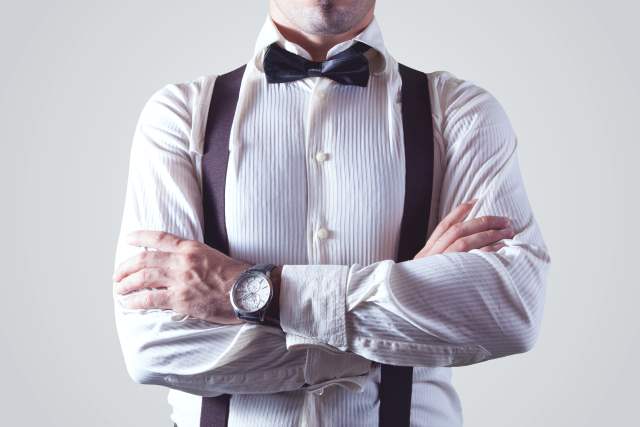 Business man with bowtie and suspenders