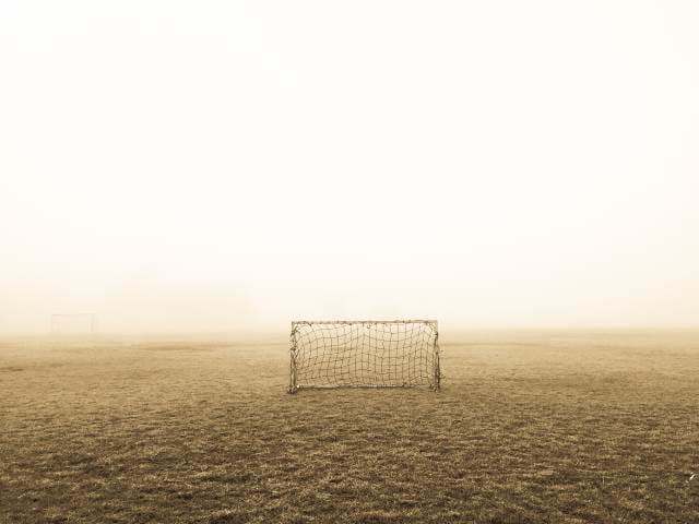 A Single Goal post in the middle of the desert