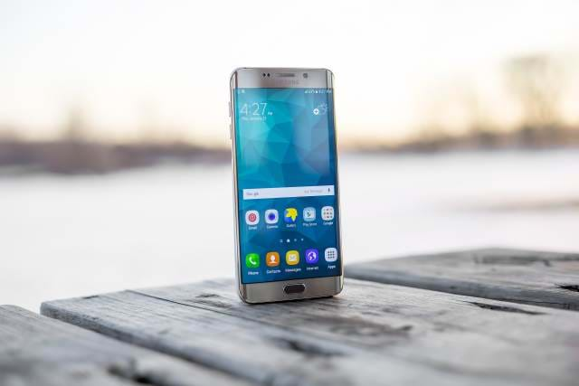 Smartphone sitting up on table