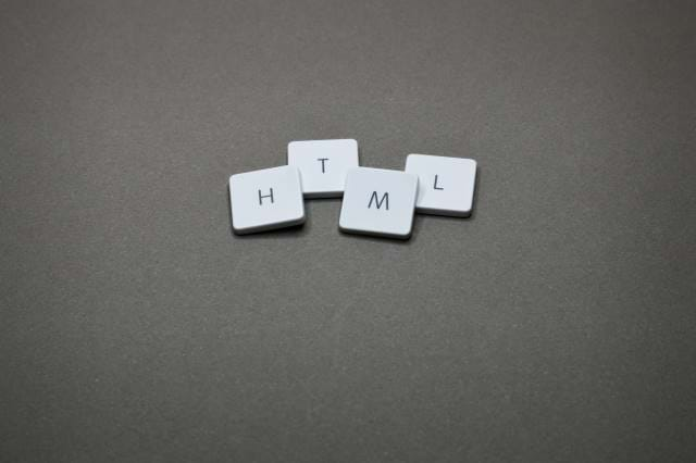 Scrabble pieces that spell HTML