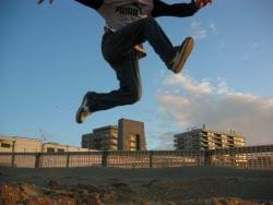 Man jumping in the air on a beach