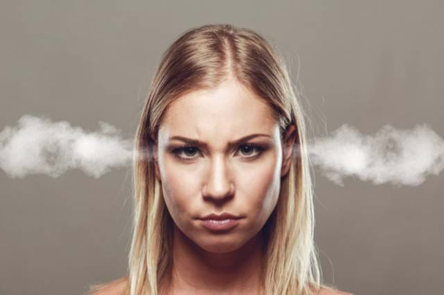 Woman angry with smoke coming out her ears