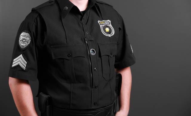 'I am de LAW!' Torso view of a human cop