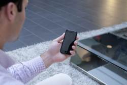 8 Ways to Bake Mobile Into Your ASP.NET MVC Site Man looking at his smart phone