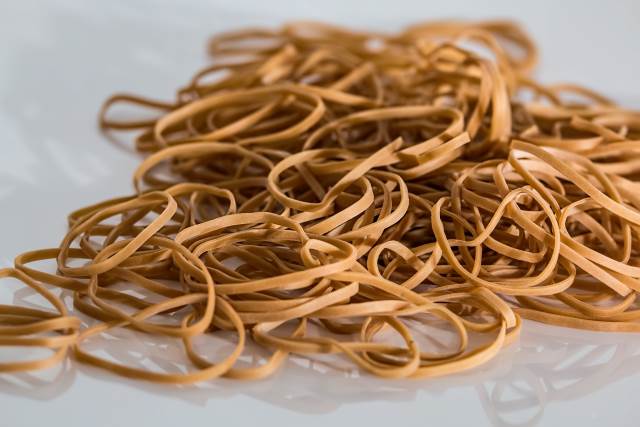 a collection of rubber bands on a table